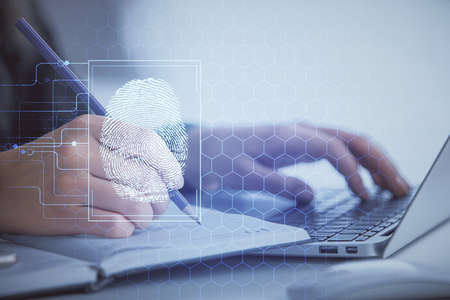 Double exposure of woman hands typing on computer and fingerprint drawing. Security concept.