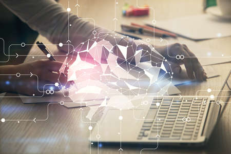 Multi exposure of woman hands working on computer and human brain hologram drawing. Ai tech concept.