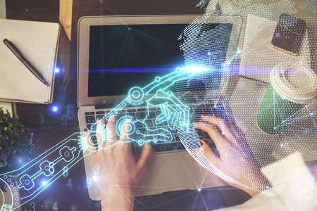 Double exposure of woman hands typing on computer and technology theme drawing. High Tech concept.