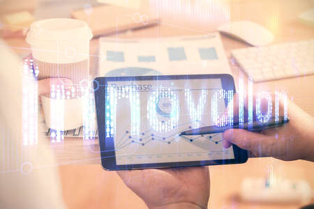 Multi exposure of man's hands holding and using a digital device and data theme drawing. Innovation...