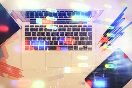 Multi exposure of data drawing hologram over topview of study desk background with computer. Concept...