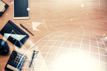 Double exposure of map sketch and table top veiw. Concept of international data.
