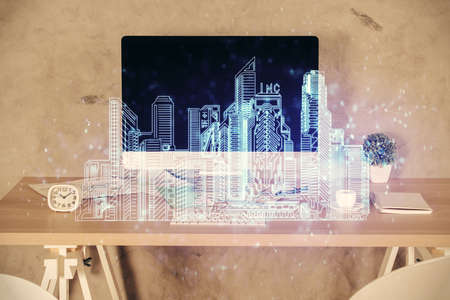 Multi exposure of town drawings and office interior background. Smart city concept.