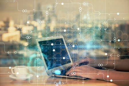 Multi exposure of woman hands working on computer and data theme hologram drawing. Tech concept.