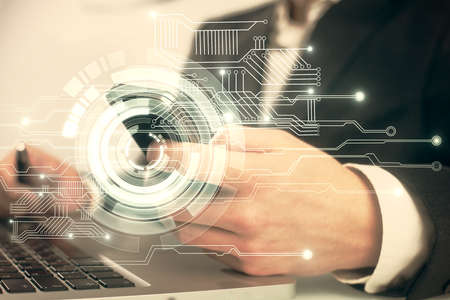Multi exposure of man's hand holding and using a digital device and data theme drawing. Innovation...