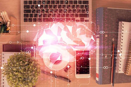 Double exposure of brain drawing over work table desktop. Top view. Global data analysis concept.