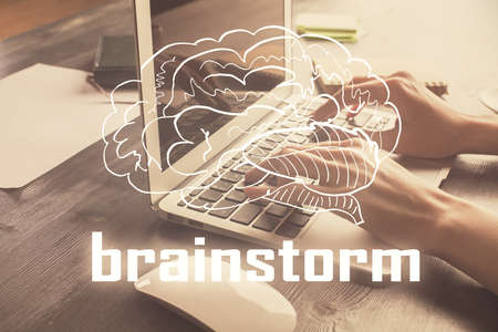 Double exposure of woman hands typing on computer and creative drawing. Start up concept.