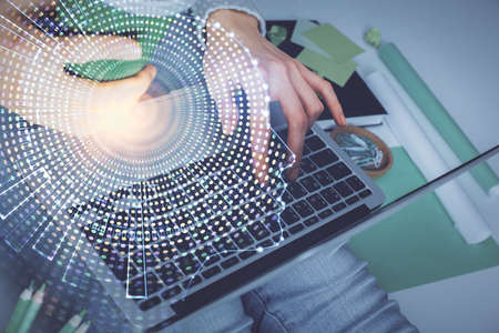 Double exposure of woman hands working on computer and brain hologram drawing. Ai concept.