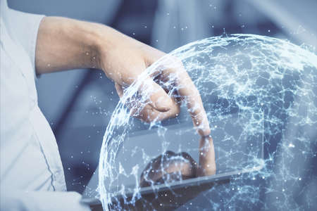 Double exposure of man's hands holding and using a phone and social network theme drawing.の写真素材