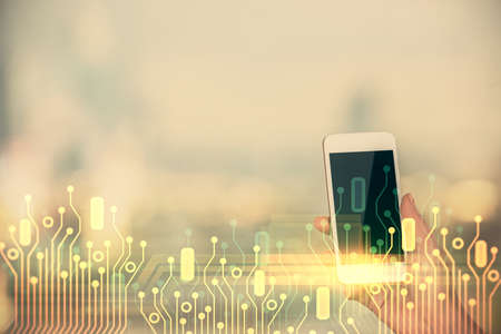 Double exposure of technology sketch hologram and woman holding and using a mobile device.