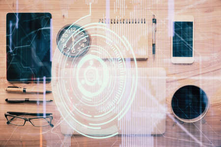 Multi exposure of technology theme drawing over work table desktop. Top view. Global data analysis concept.の写真素材