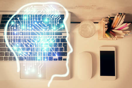 Multi exposure of brain sketch hologram over topview work table background with computer. Concept of...