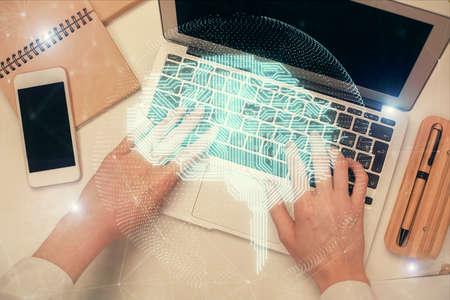 Double exposure of woman working on computer andhuman brain hologram drawing. Top View. Ai concept.