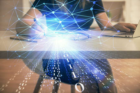 Multi exposure of woman hands working on computer and data theme hologram drawing. Tech concept.