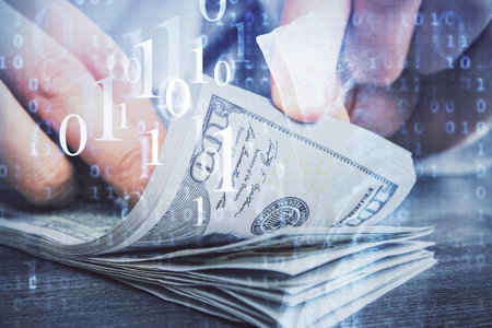 Double exposure of technology drawing hologram and us dollars bills and man hands. Data conceptの写真素材