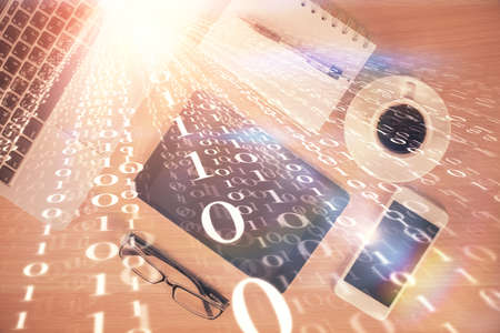 Double exposure of technology theme drawing over work table desktop. Top view. Global data analysis...