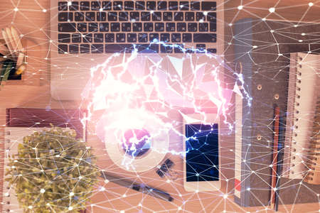 Double exposure of brain drawing over work table desktop. Top view. Global data analysis concept.