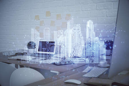 Multi exposure of town drawings and office interior background. Smart city concept.の写真素材