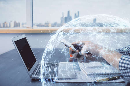Double exposure of man's hands holding and using a phone and social network theme drawing.