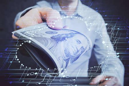 Double exposure of technology drawing hologram and us dollars bills and man hands. Data conceptの写真素材