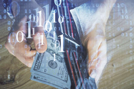 Double exposure of technology drawing hologram and us dollars bills and man hands. Data conceptの写真素材