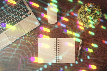 Double exposure of data theme drawing hologram over topview work table background with computer. Concept of technology.の写真素材