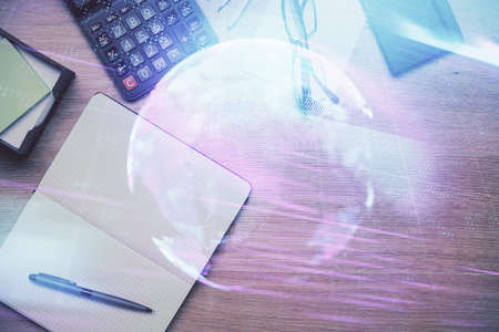 Double exposure of technology drawing and work table top veiw. Concept of hightech.の写真素材