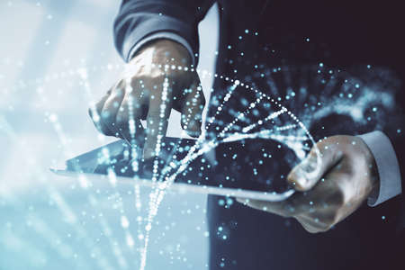 Double exposure of man's hands holding and using a phone and DNA drawing. Medical education concept.の写真素材