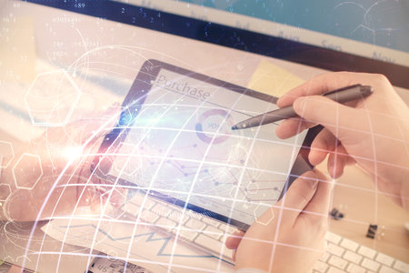 Multi exposure of man's hands holding and using a digital device and map drawing. International business concept.の写真素材