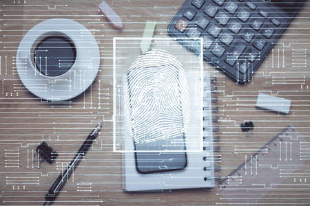 Double exposure of finger print over table with phone. Top view. Concept of mobile security.