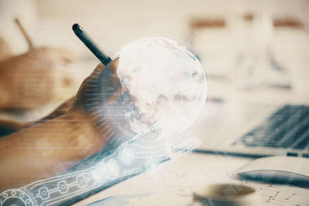 Double exposure of map drawing over people taking notes background. Concept of international connectionの写真素材