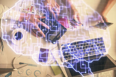 Double exposure of man and woman working together and human brain hologram drawing. Brainstorm...