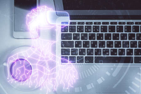 AR hologram drawings over computer on the desktop background. Top view. Multi exposure. Concept of...