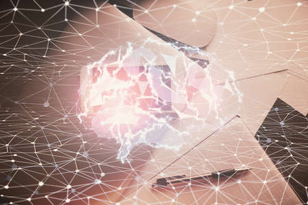 Double exposure of brain drawing over work table desktop. Top view. Global data analysis concept.の写真素材