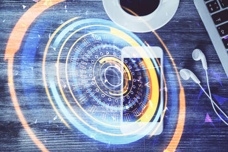 Multi exposure of technology theme drawing over table with phone. Top view. Concept of hightech.
