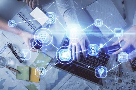 Double exposure of man and woman working together and social network theme hologram drawing. Computer background. connecting concept. Top View.の写真素材
