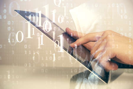 Multi exposure of man's hand holding and using a digital device and data theme drawing. Innovation...