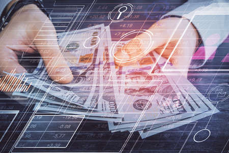 Multi exposure of technology drawing hologram and us dollars bills and man hands. Data concept