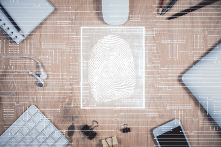 Double exposure of finger print over table with phone. Top view. Concept of mobile security.の写真素材