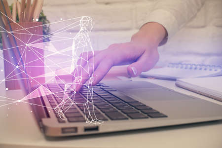 Double exposure of woman hands typing on computer and creative drawing. Start up concept.