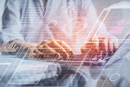 Double exposure of woman hands working on computer and data theme hologram drawing. Tech concept.