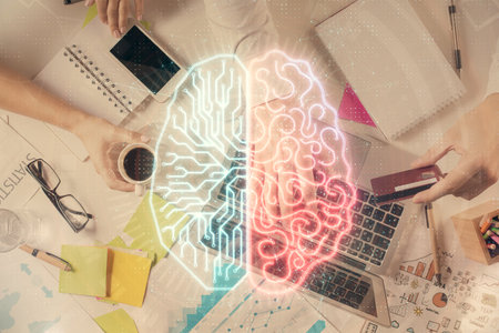 Double exposure of man's hands typing over computer keyboard and brain hologram drawing. Top view....