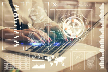 Multi exposure of woman hands working on computer and data theme hologram drawing. Tech concept.