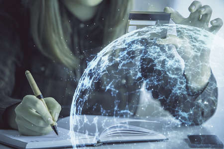 Multi exposure of woman on-line shopping holding a credit card and social network theme drawing....