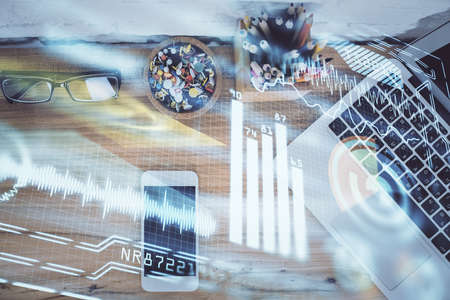 Multi exposure of technology theme drawing over table with phone. Top view. Concept of hightech.の写真素材
