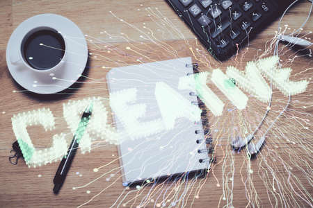 Double exposure of creative drawing and work table top veiw. Concept of startup.