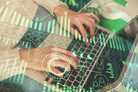 Double exposure of woman hands typing on computer and technology theme drawing. High Tech concept.