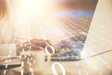 Multi exposure of woman hands working on computer and data theme hologram drawing. Tech concept.