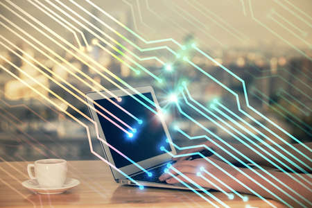 Multi exposure of woman hands working on computer and data theme hologram drawing. Tech concept.