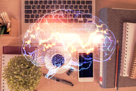 Double exposure of brain drawing over work table desktop. Top view. Global data analysis concept.